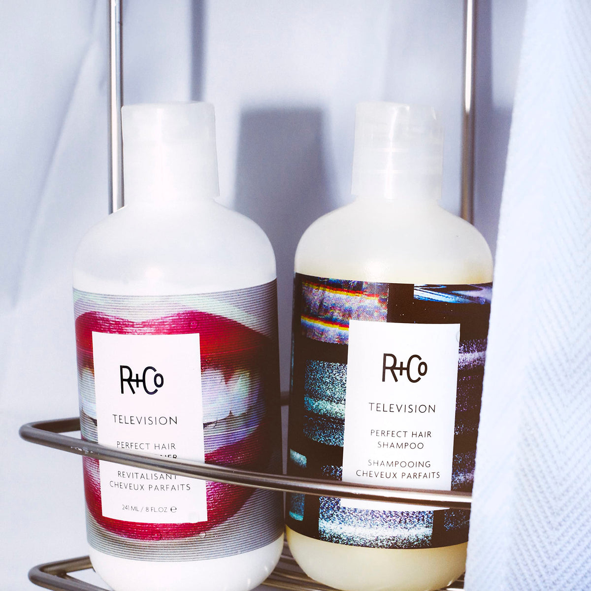 R+Co Television next to passport showing compact 60 ml travel size for trips