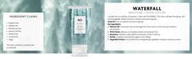 Applying R+Co Waterfall to damp hair demonstrating detangling and smoothing action