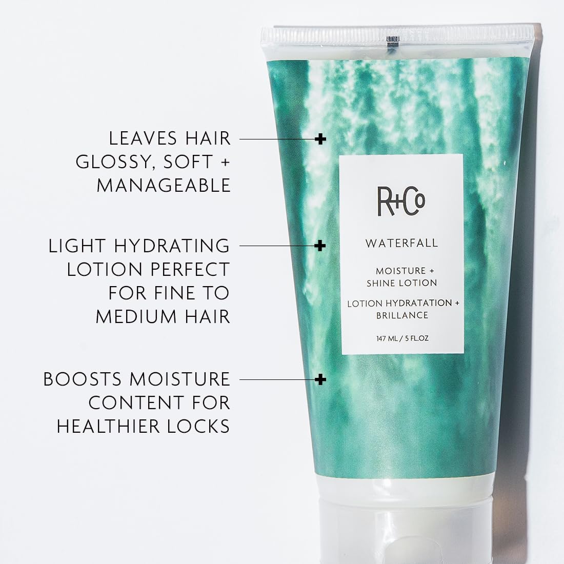 R+Co texture on palm dispensed from pump demonstrating lightweight lotion and easy spread