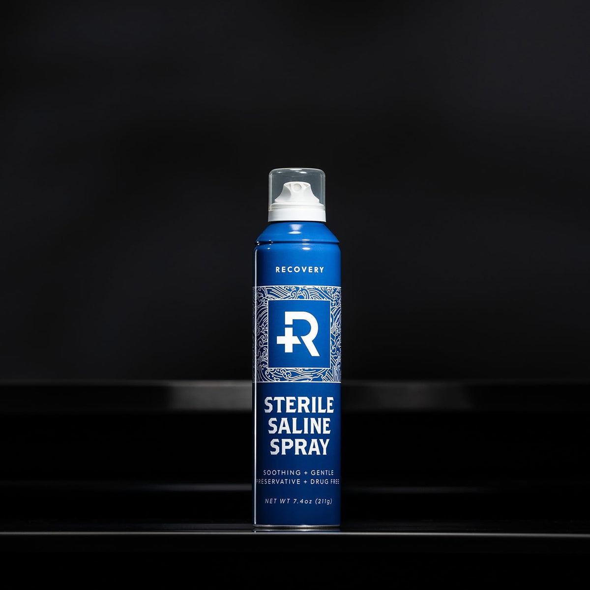 Recovery Aftercare spray in hand illustrating easy application