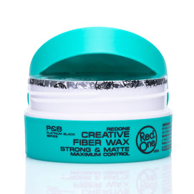 RED ONE open jar showing wax texture with fibrous strands for styling control