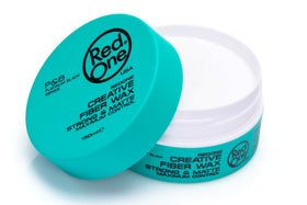 RED ONE jar next to a hand to show 100ml size and portable grooming convenience
