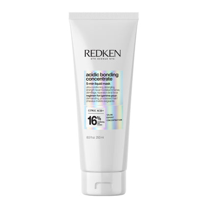 Redken front bottle showing product branding and quick use benefits