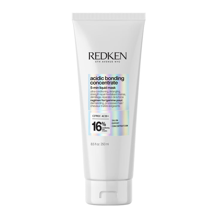 Redken front bottle showing product branding and quick use benefits