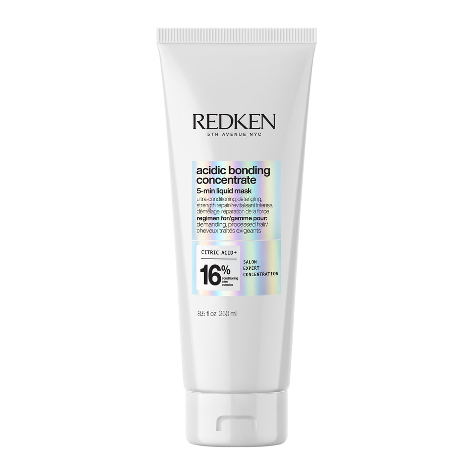 Redken front bottle showing product branding and quick use benefits
