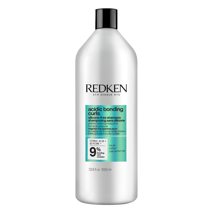 Redken product front packaging showing brand and repair benefits