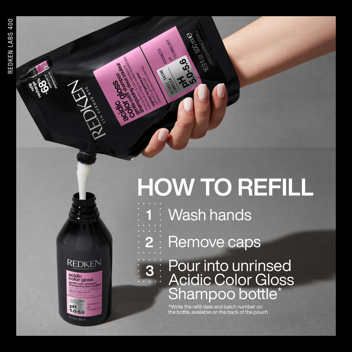 Stylist applying Redken shampoo in salon delivering color-safe cleanse