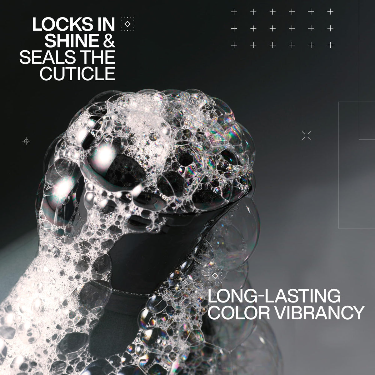 Redken bottle close-up highlighting pump and salon-grade design benefit