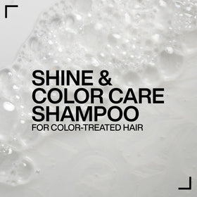 Redken bottle beside refill to show size and plastic-saving comparison