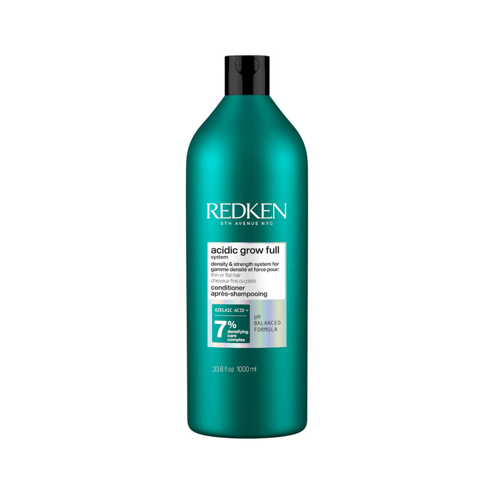 Redken bottle front packaging showing product benefit and branding