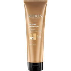 Redken jar front view showing product branding and rich conditioning benefits
