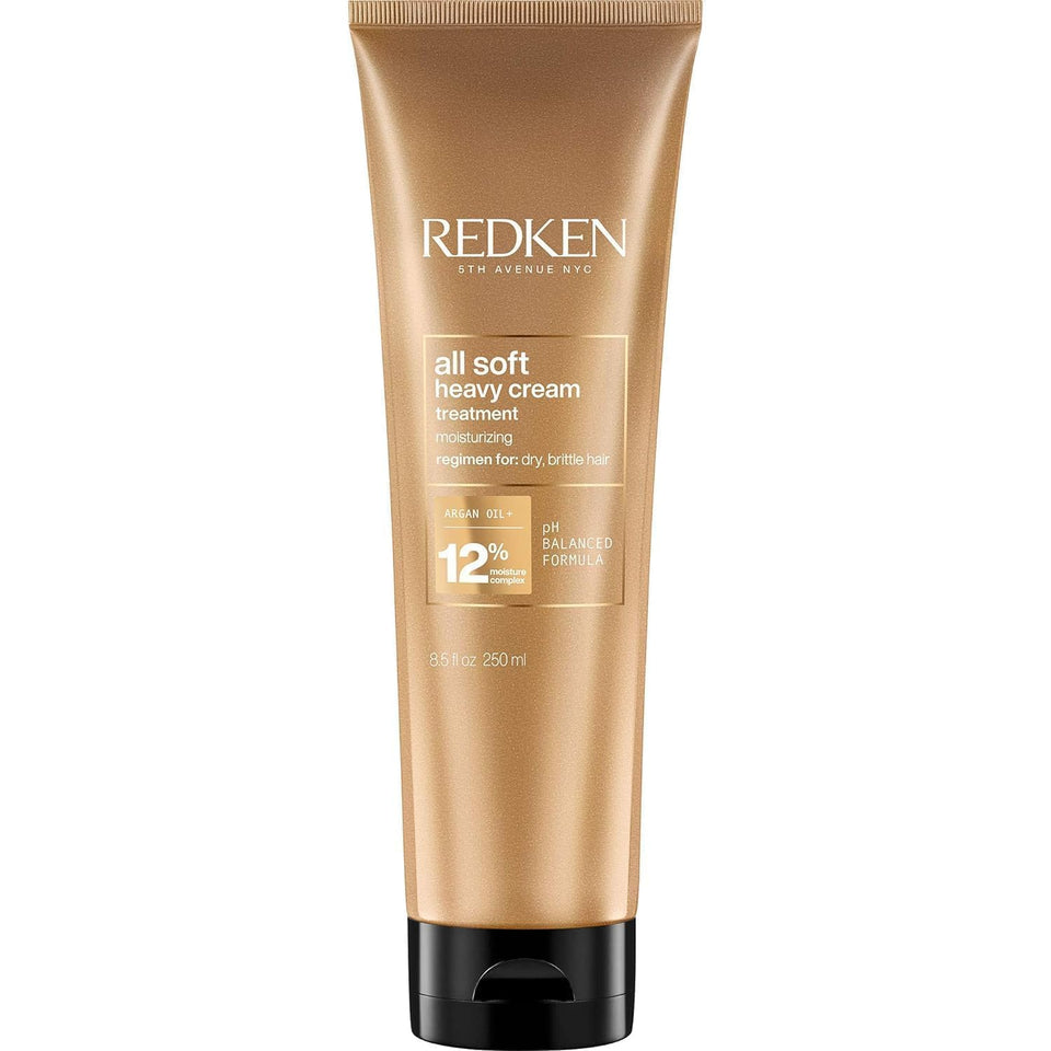 Redken jar front view showing product branding and rich conditioning benefits