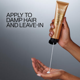 Redken label close-up listing hyaluronic acid and argan oil benefits