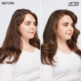 Redken being applied to damp hair in hand for even heat protection