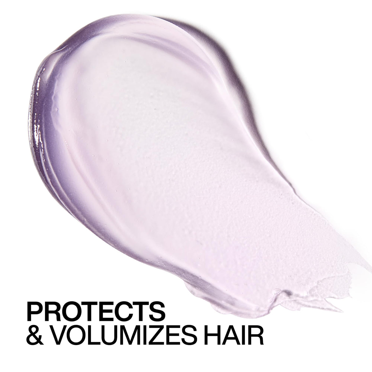 Redken in a salon-like blowdry setting delivering frizz control