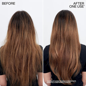 Redken bonding conditioner on bathroom shelf lifestyle for routine use