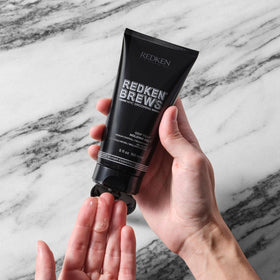 redken brews applied on curly hair showing defined curls and natural movement