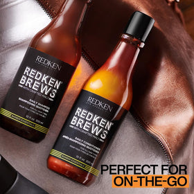 Redken Brews bottle beside razor showing daily grooming size convenience