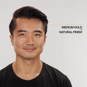Redken Brews tub open revealing smooth cream texture for easy application