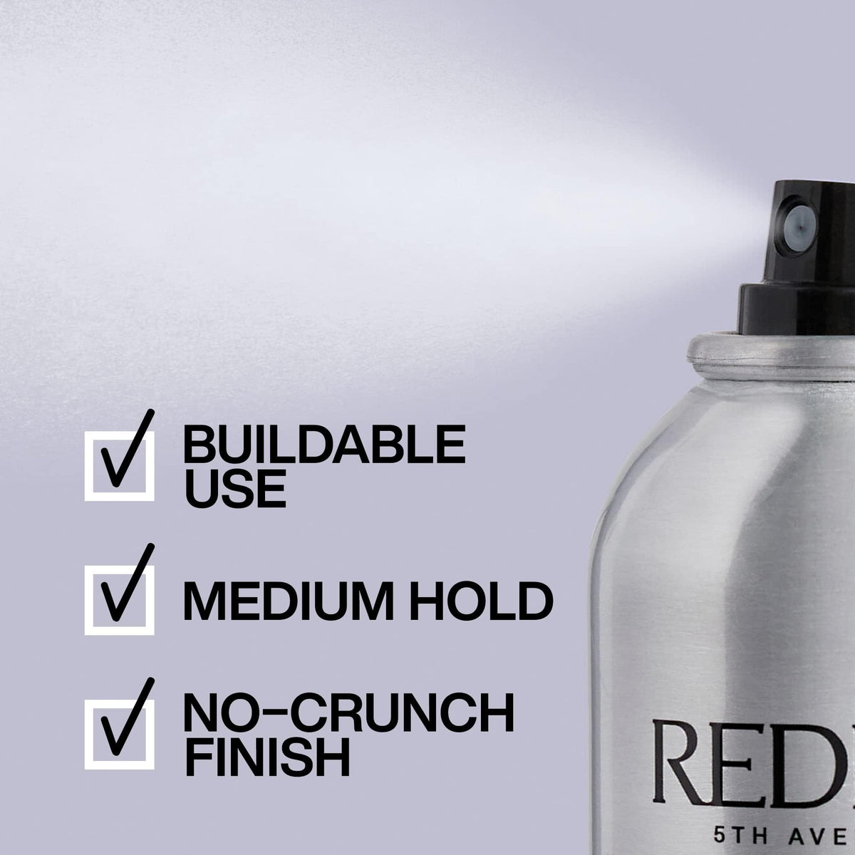 Stylist applying Redken to curly hair to define curls and reduce frizz benefit