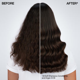 Redken conditioner cream texture on palm illustrating smooth consistency and slip