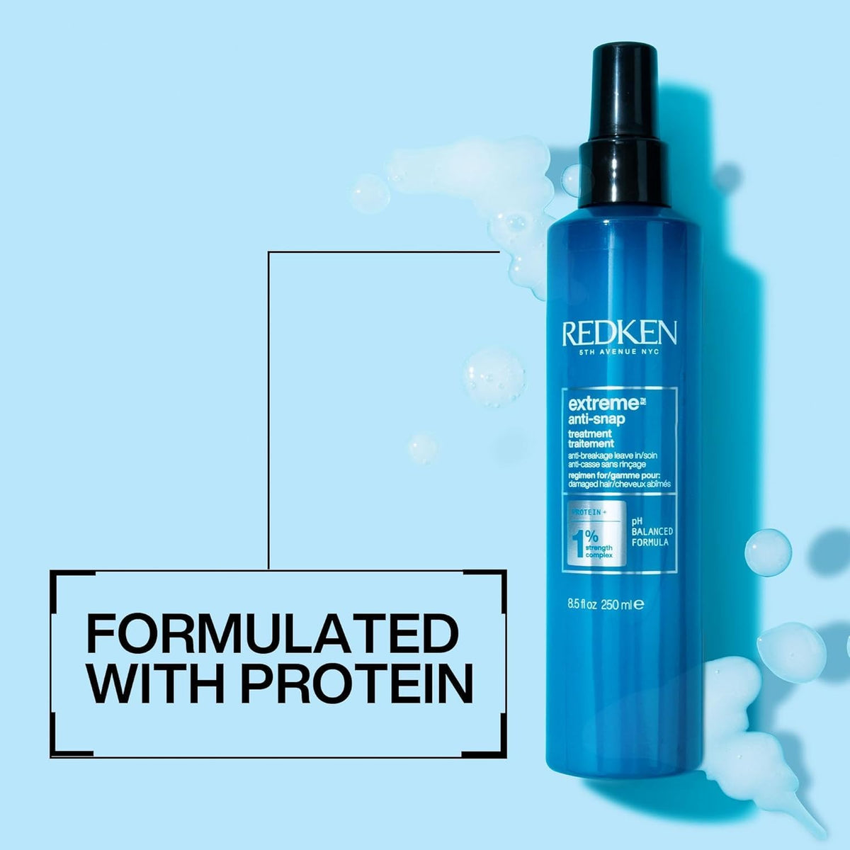 Product next to hand for Redken scale, showing compact size and travel convenience