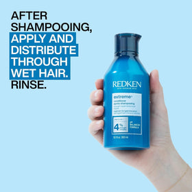 Redken Extreme Conditioner applied in shower demonstrating easy spreadability