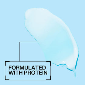 Redken Extreme Conditioner label detail highlighting Strength Complex ingredients