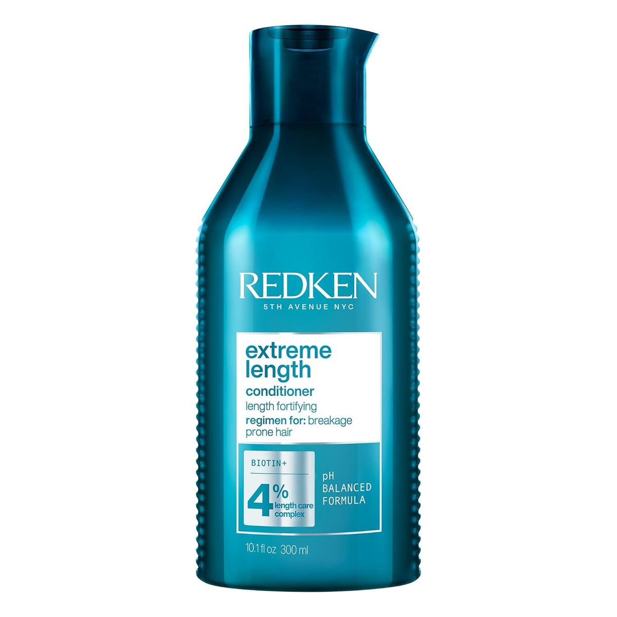 Redken bottle front packaging showing product and benefits