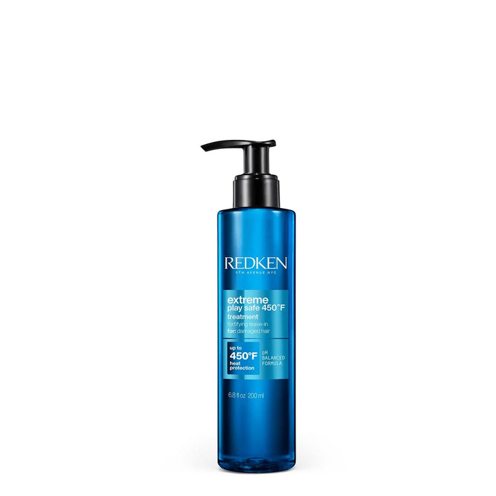 Redken bottle front packaging showing product name and benefits