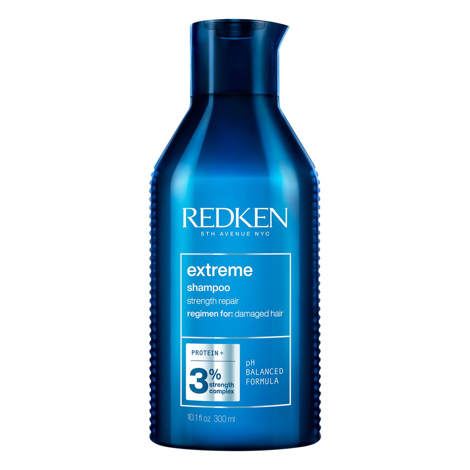Redken Extreme Shampoo front bottle showing label and professional strength benefits