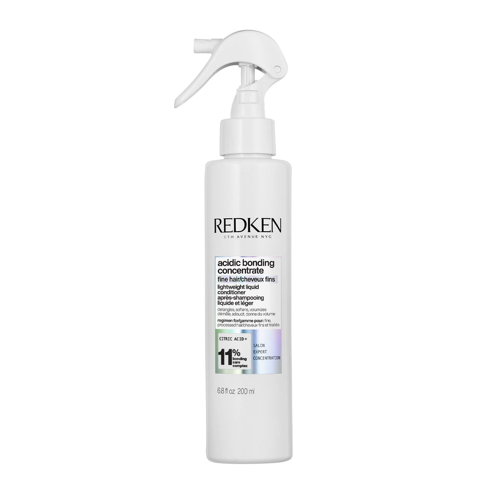 Redken front packaging showing bottle and brand for clear product identification and trust