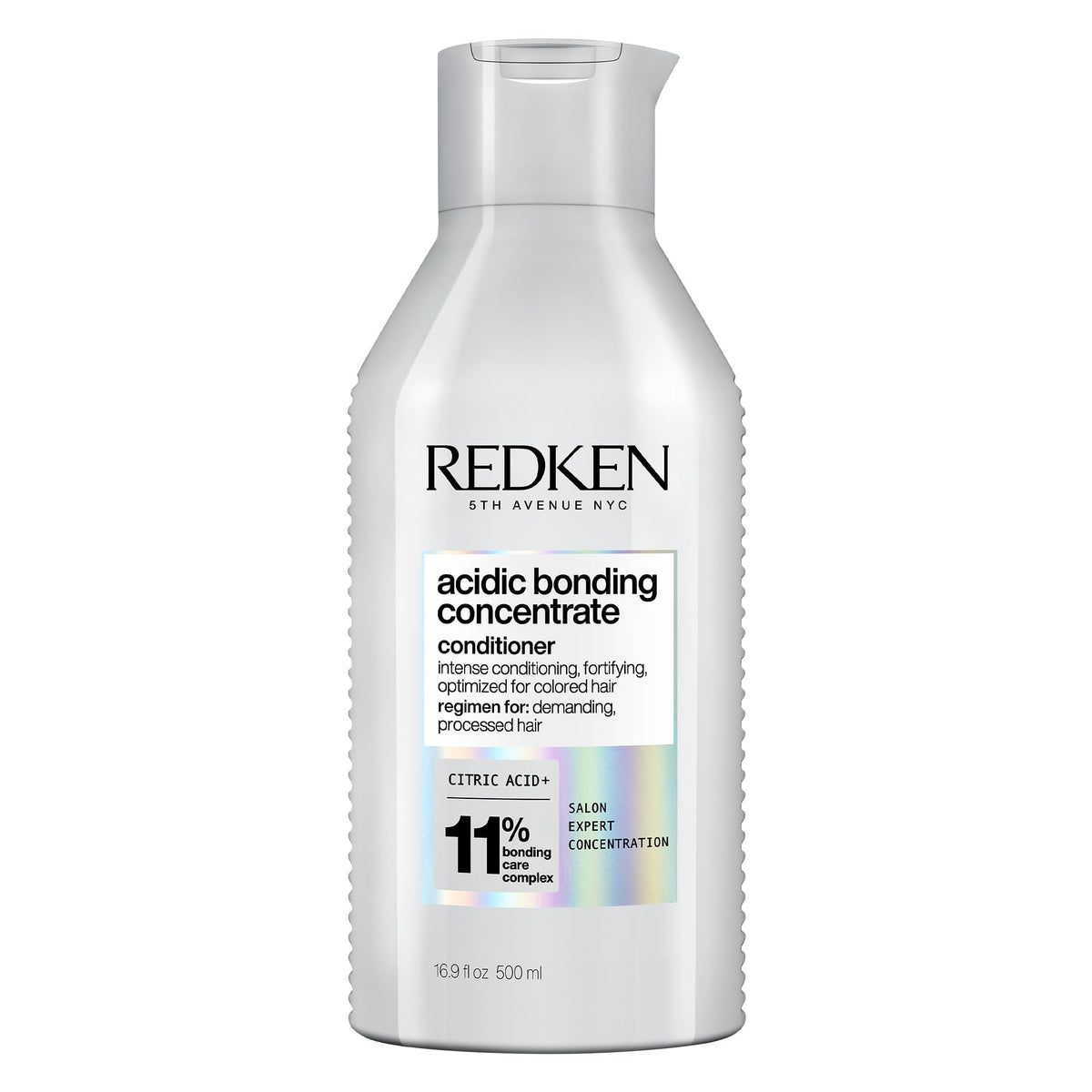 Redken front packaging showing bottle and product benefit for repair