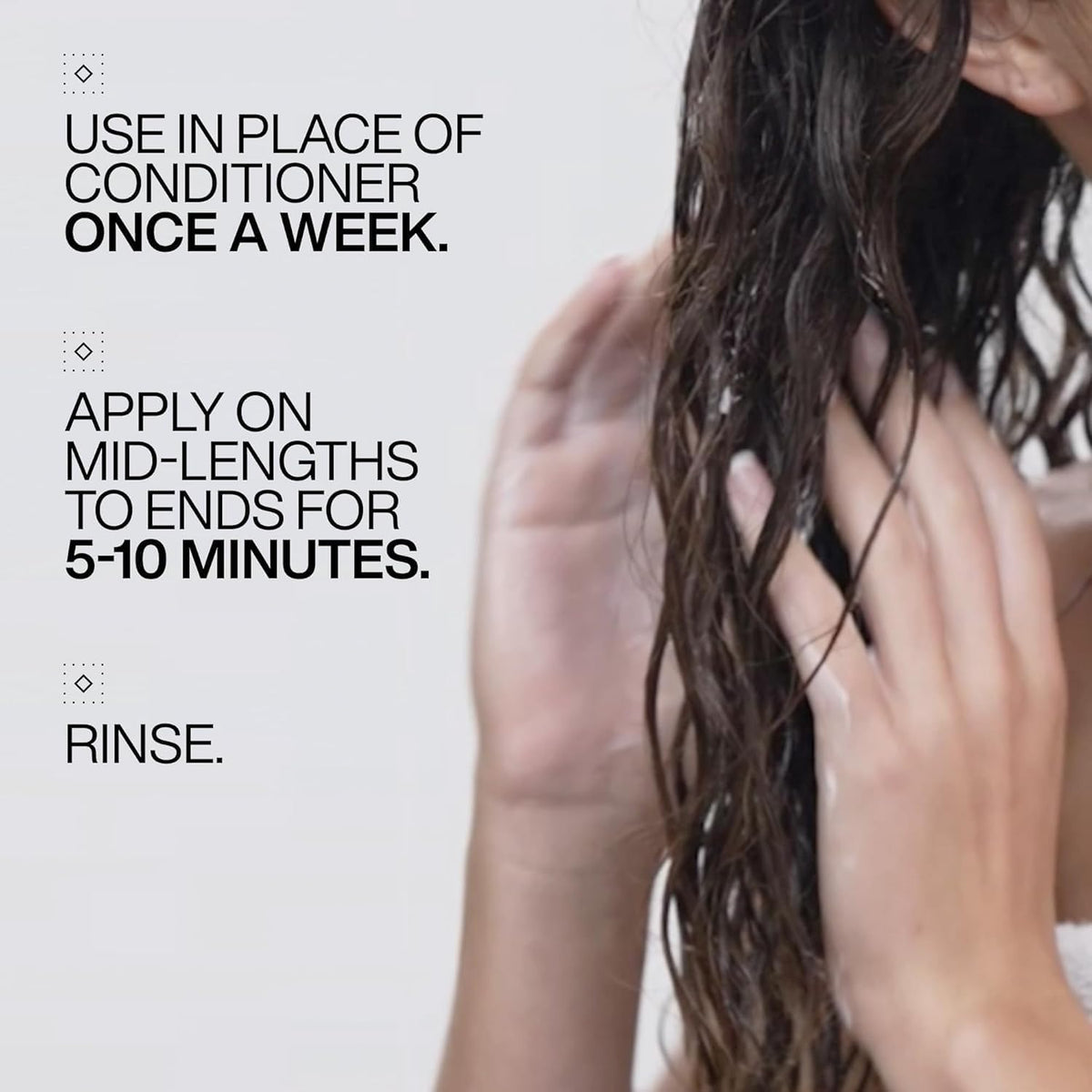 Label close-up of Redken All Soft detailing usage and ingredient benefits