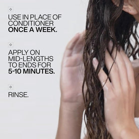 Label close-up of Redken All Soft detailing usage and ingredient benefits