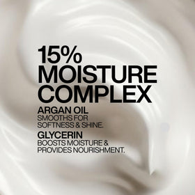 Redken mask applied to damp hair mid-lengths to ends improving manageability