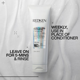 Redken mask being applied to wet hair for hydration and detangling