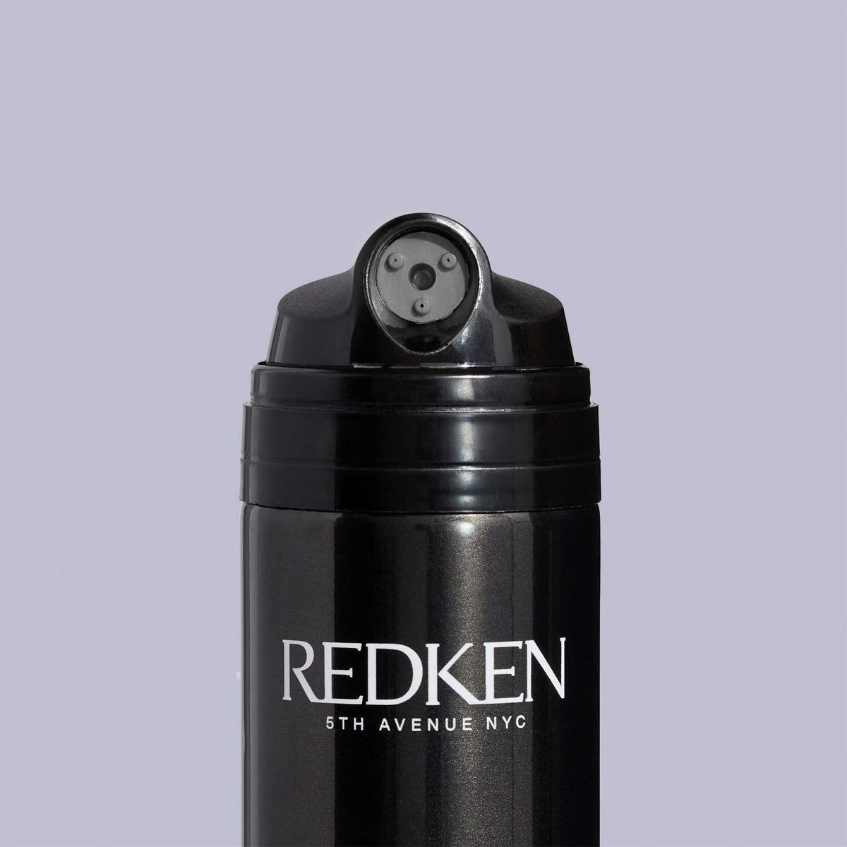 Redken Max Hold Hairspray 4oz size on shelf for scale and travel convenience