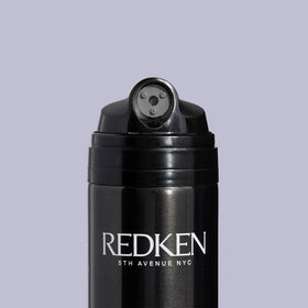 Redken Max Hold Hairspray 4oz size on shelf for scale and travel convenience