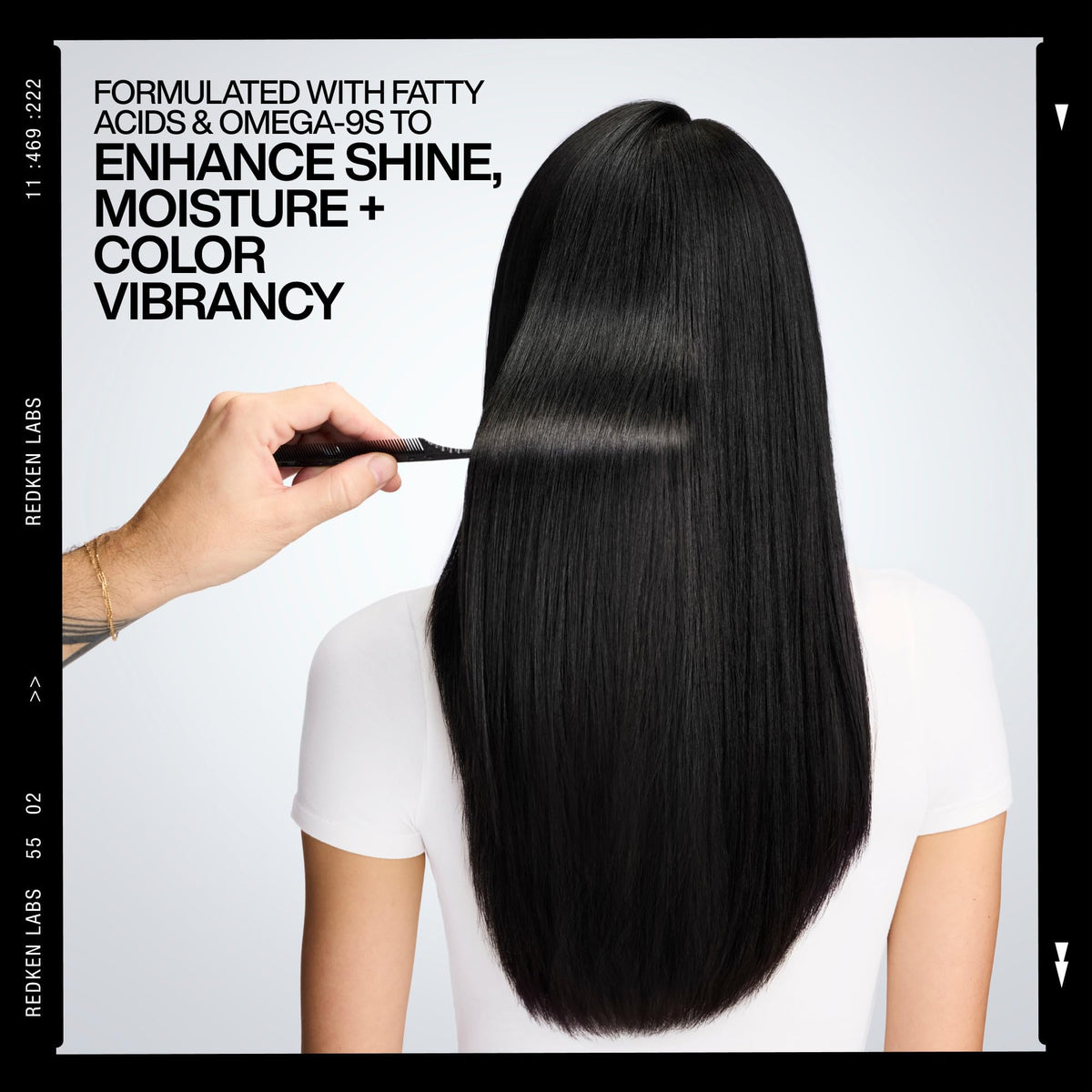 Redken on model with shiny hair illustrating color vibrancy benefits