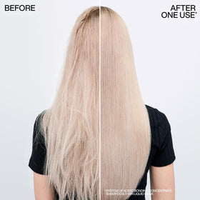 Redken label detail highlighting ingredients and bond-building benefit