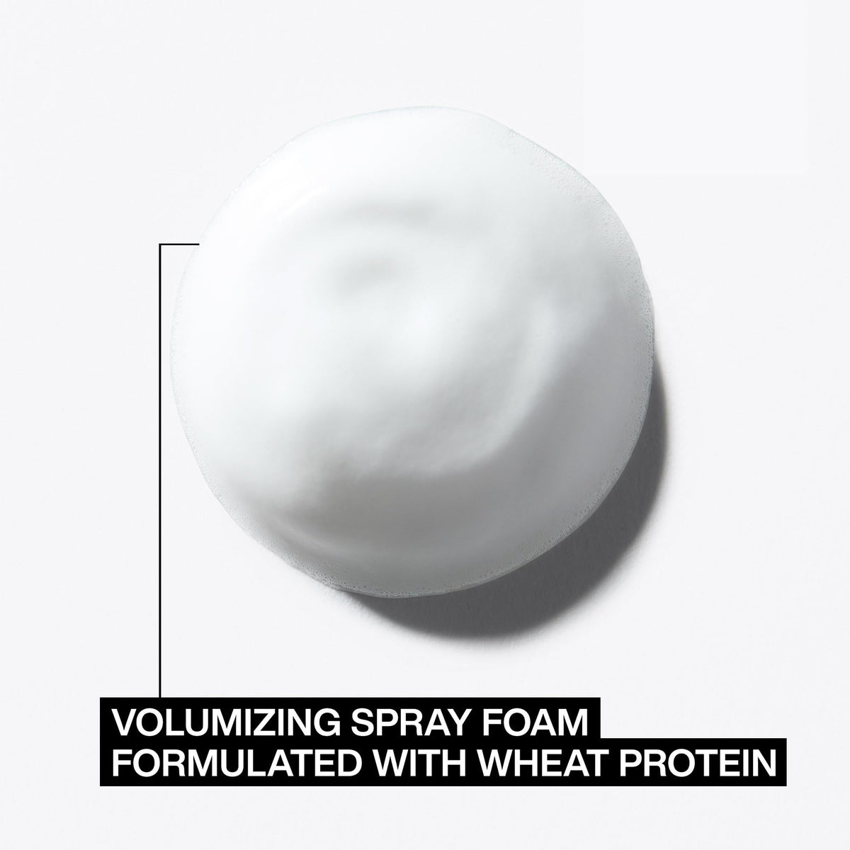 Redken root lifter in use during blow-dry delivering visible lift
