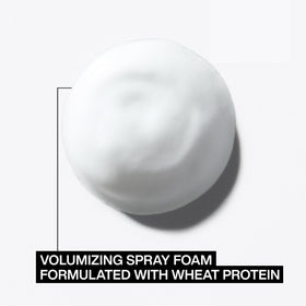 Redken root lifter in use during blow-dry for lifted roots and volume