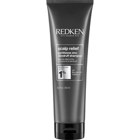 Redken front packaging showing bottle and benefit of dandruff control