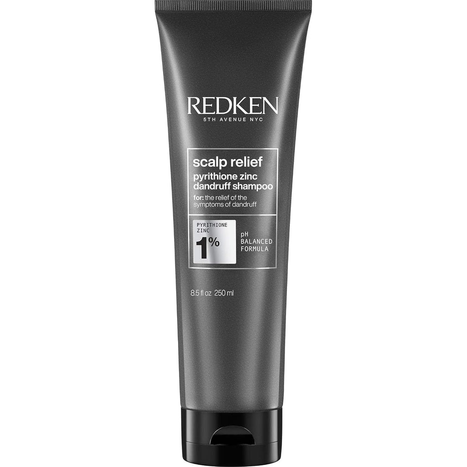 Redken front packaging showing bottle and benefit of dandruff control