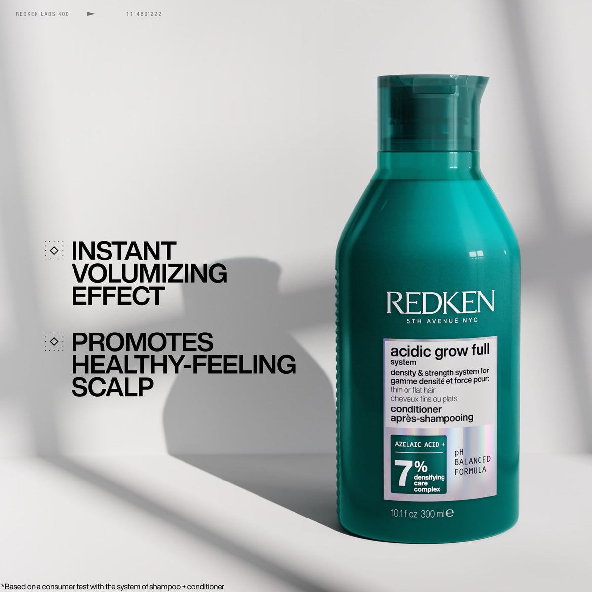 Redken bottle next to ruler size comparison to show 10.1 fl oz travel-friendly volume