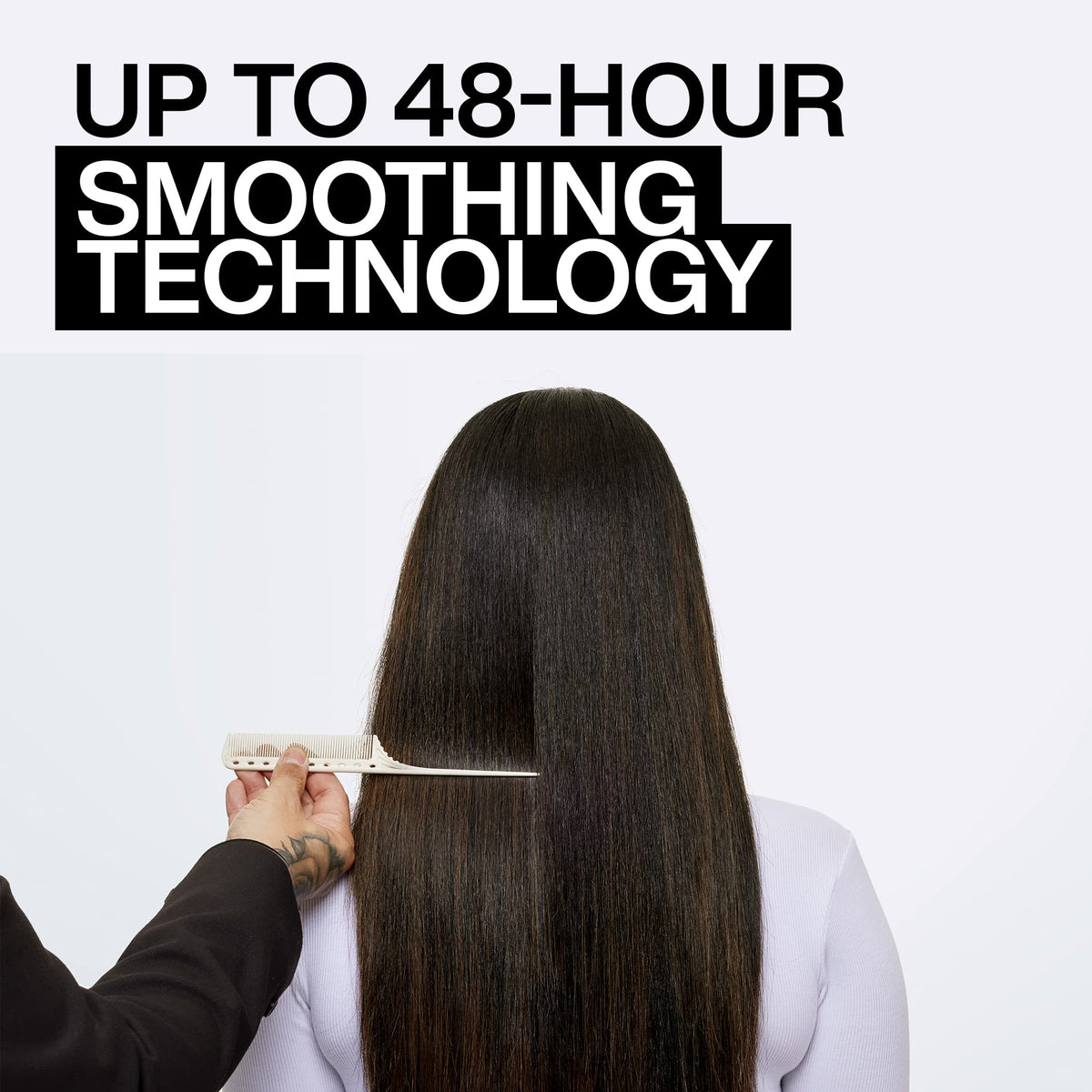 Redken spray smooth being applied to damp hair for heat-styling prep
