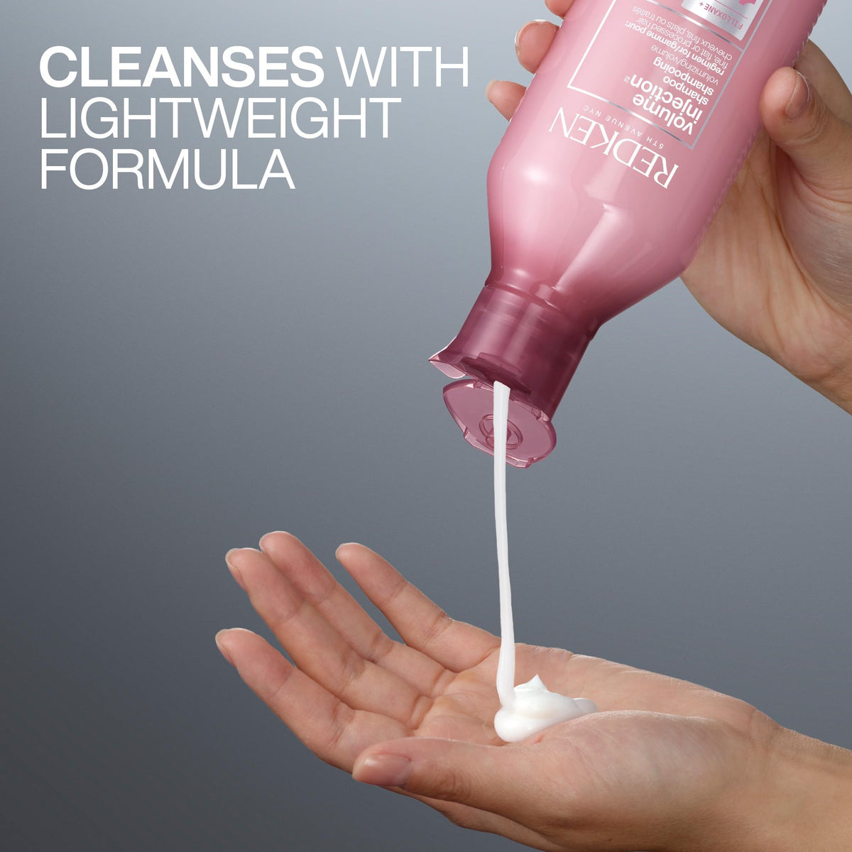 Redken shampoo applied to wet hair showing lightweight cleansing benefit
