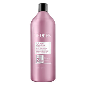 Redken bottle front view showing product and volumizing benefit