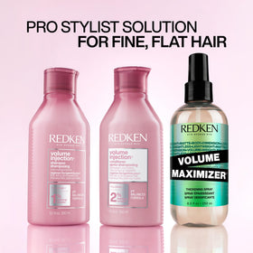 Redken Volume Injection Conditioner 10.1 fl oz beside ruler for size comparison and travel convenience